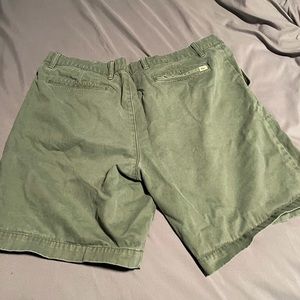 Lacoste shorts size 40, green in color.